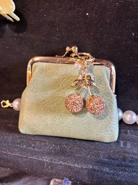 Elegant Mint Green Coin Purse with Gold Cherry Charm
